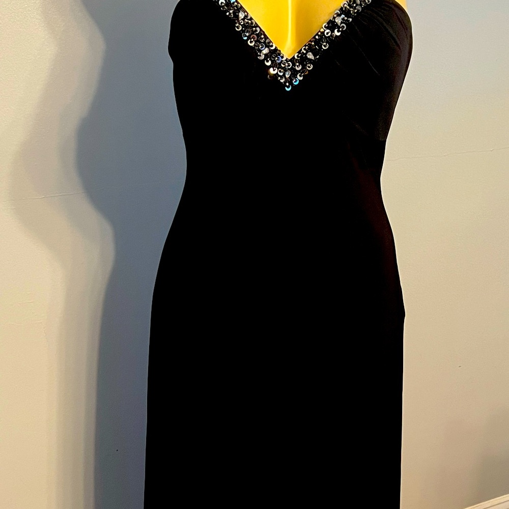 Evening gown,floor length embellishment straps, embellishment back design